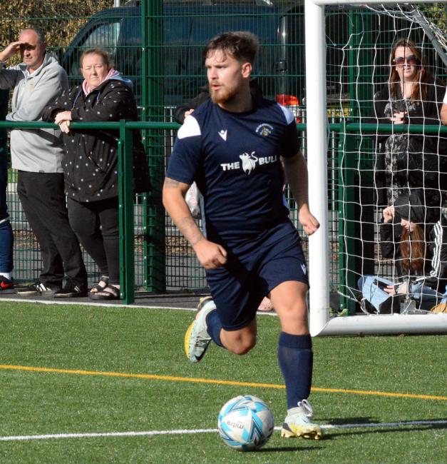 Will Evans scored a hat-trick for Merlins Bridge